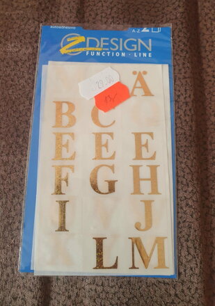 Samolepky třpitivé  zlaté písmena rozbaleno